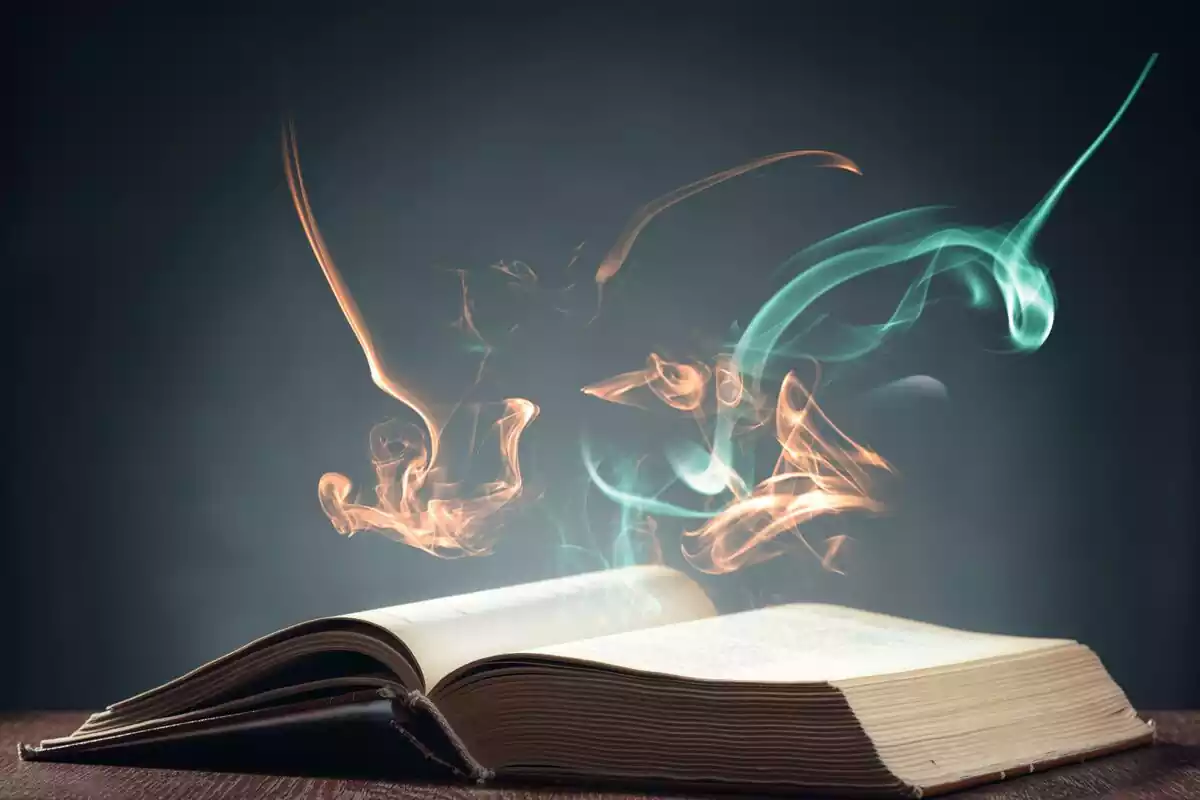 Open book with magic light