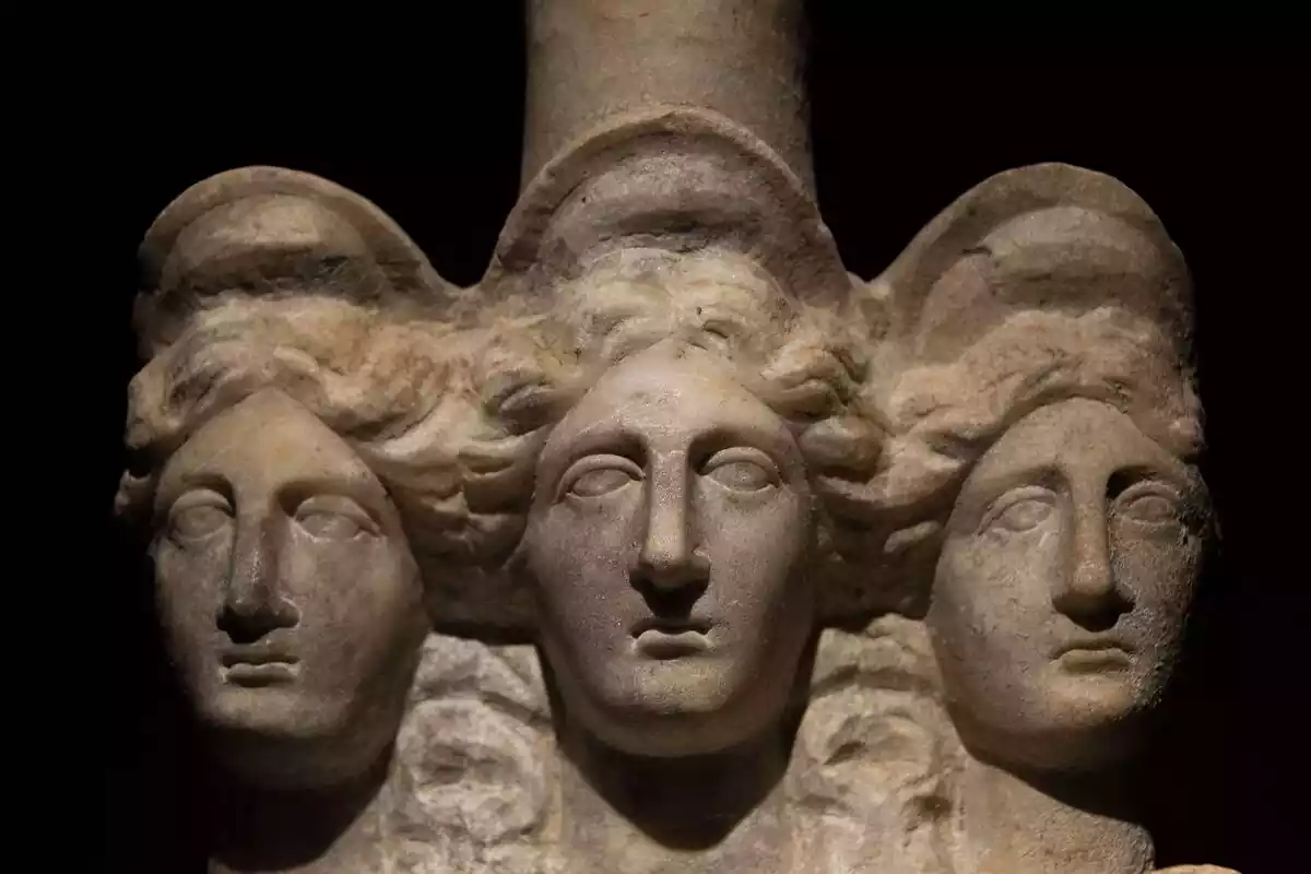 Statue of three headed women