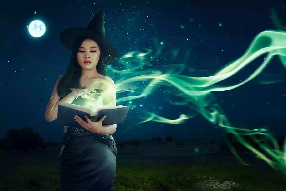 Young witch casting a spell